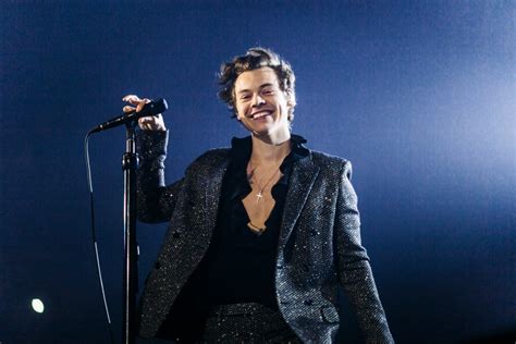 Harry Styles Wears Glitter Saint Laurent Suit in Paris